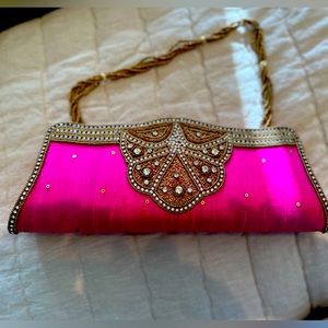 Silk embroidered clutch in hot pink and gold